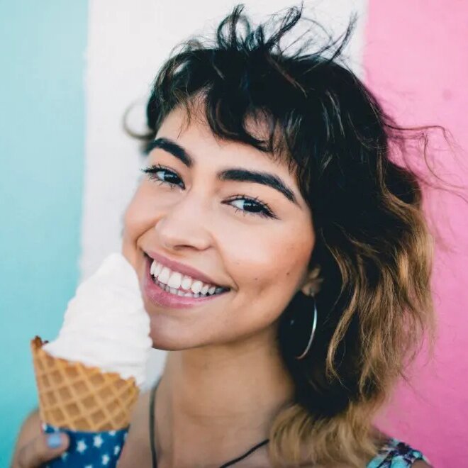 Smiling girl with ice cream